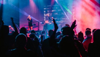 woman singing on stage
